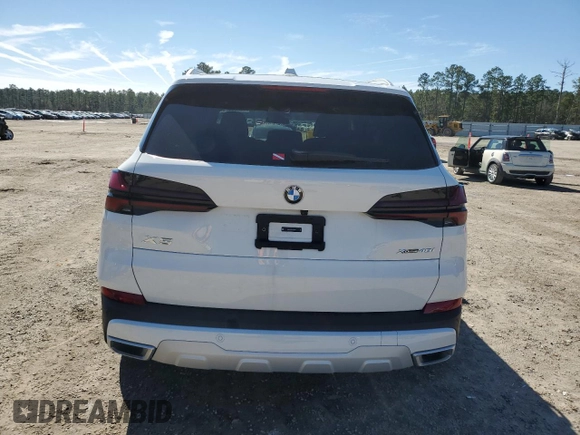 2025 BMW X5 xDrive40i with VIN 5UX23EU05S9Y55524, listed as a Copart auction lot 45135275 with 1,442 mi miles and Salvage Title. Bid and sale history available at carsss.com. Image 6.