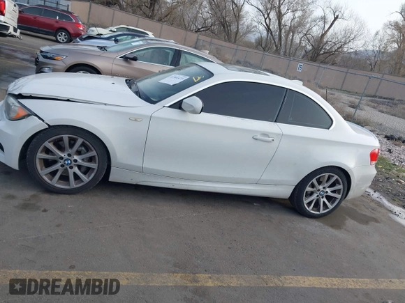 2013 BMW 1 Series 135i with VIN WBAUC9C52DVM13628, listed as a IAAI auction lot 41901475 with 113,598 mi miles and . Bid and sale history available at DreamBid. Image 14.