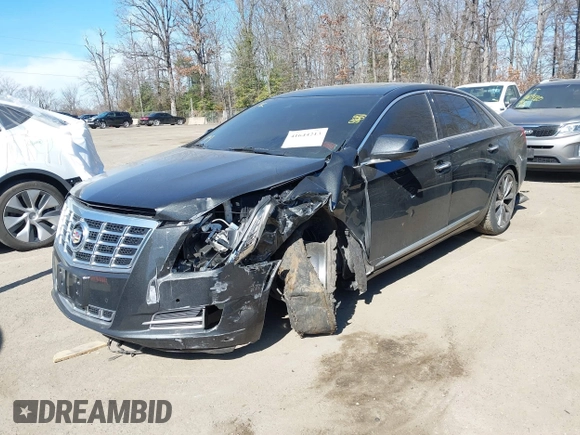 2013 Cadillac XTS Luxury z VIN 2G61R5S33D9184878, wystawiony jako IAAI lot #41644213 z przebiegiem 113 293 mil mil oraz . Historia ofert i sprzedaży dostępna na DreamBid. Obrazek 17.