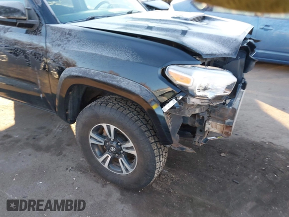 2016 Toyota Tacoma SR with VIN 3TMCZ5AN0GM023263, listed as a IAAI auction lot 41302069 with 137,276 mi miles and . Bid and sale history available at DreamBid. Image 19.