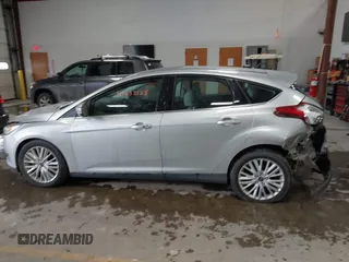 2018 Ford Focus Titanium with VIN 1FADP3N25JL261736, listed as a IAAI auction lot 41032128 with 59,142 mi miles and . Bid and sale history available at DreamBid. Image 14.