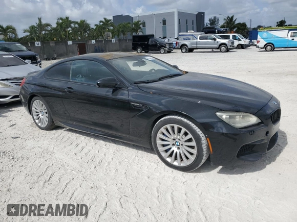 2014 BMW M6 z VIN WBSLX9C59ED160536, wystawiony jako Copart lot #55142095 z przebiegiem 78 550 mil mil oraz Tytuł czysty. Historia ofert i sprzedaży dostępna na DreamBid. Obrazek 4.