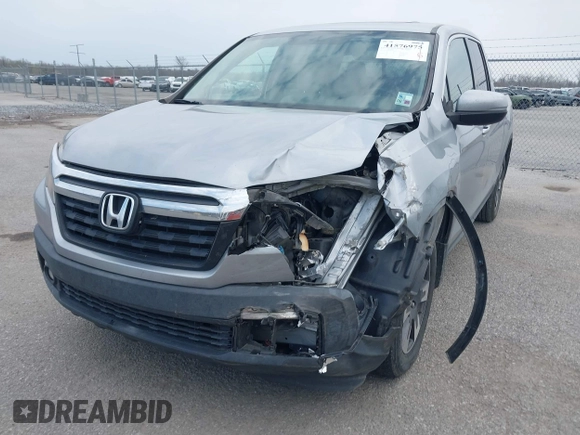 2019 Honda Ridgeline RTL with VIN 5FPYK2F50KB004055, listed as a IAAI auction lot 41576975 with 128,620 mi miles and . Bid and sale history available at DreamBid. Image 6.
