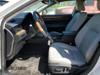 2013 Lexus ES 300h with VIN JTHBW1GG3D2037164, listed as a Copart auction lot 52035215 with 100,608 mi miles and Salvage Title. Bid and sale history available at DreamBid. Image 7.