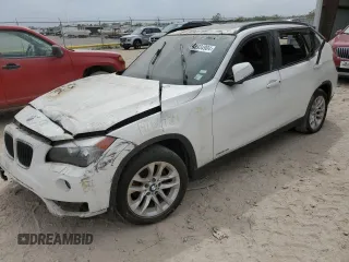 2015 BMW X1 xDrive28i with VIN WBAVL1C5XFVY32741, listed as a Copart auction lot 70323344 with 0 mi miles and Salvage Title. Bid and sale history available at carsss.com. Image 1.