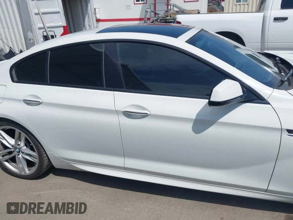 2015 BMW 6 Series 640i with VIN WBA6A0C56FD318007, listed as a IAAI auction lot 42041430 with 78,281 mi miles. Bid and sale history available at carsss.com. Image 13.
