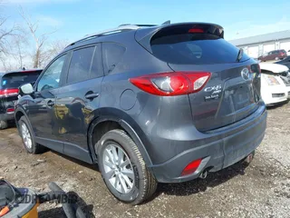 2016 Mazda CX-5 Touring with VIN JM3KE4CY9G0915305, listed as a IAAI auction lot 41840519 with 188,702 mi miles and . Bid and sale history available at carsss.com. Image 3.