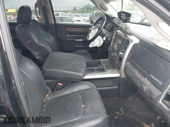 2013 Ram 2500 Laramie z VIN 3C6UR5FL0DG516938, wystawiony jako IAAI lot #39916278 z przebiegiem 198 845 mil mil oraz . Historia ofert i sprzedaży dostępna na DreamBid. Obrazek 5.