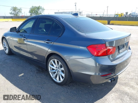 2012 BMW 3 Series 328i with VIN WBA3A5C5XCF342956, listed as a IAAI auction lot 42167647 with 154,972 mi miles and . Bid and sale history available at carsss.com. Image 3.