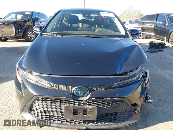 2021 Toyota Corolla Hybrid LE with VIN JTDEAMDE5MJ014959, listed as a IAAI auction lot 41751203 with 26,220 mi miles. Bid and sale history available at carsss.com. Image 12.