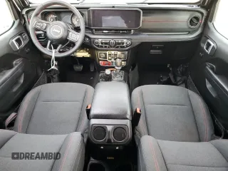 2024 Jeep Wrangler Rubicon z VIN 1C4PJXFG6RW261748, wystawiony jako Copart lot #51479585 z przebiegiem 7 911 mil mil oraz Szkoda całkowita • Salvage title. Historia ofert i sprzedaży dostępna na DreamBid. Obrazek 8.