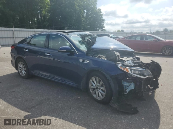 2018 Kia Optima S z VIN 5XXGT4L33JG226861, wystawiony jako Copart lot #60978105 z przebiegiem Nie podano mil oraz Szkoda całkowita • Salvage title. Historia ofert i sprzedaży dostępna na DreamBid. Obrazek 4.