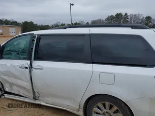 2011 Toyota Sienna XLE with VIN 5TDDK3DC0BS015244, listed as a IAAI auction lot 41413002 with 128,591 mi miles. Bid and sale history available at carsss.com. Image 14.