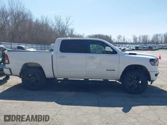 2020 Ram 1500 Big Horn with VIN 1C6SRFFT1LN103090, listed as a IAAI auction lot 41919577 with 70,429 mi miles and . Bid and sale history available at DreamBid. Image 12.