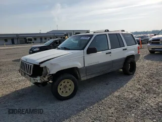 1996 Jeep Grand Cherokee Laredo with VIN 1J4EX58S3TC144191, listed as a Copart auction lot 53153495 with 197,853 mi miles and Salvage title. Bid and sale history available at DreamBid. Image 1.