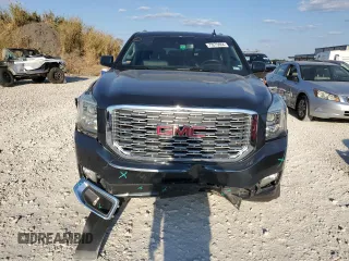 2019 GMC Yukon Denali with VIN 1GKS1CKJ9KR134571, listed as a Copart auction lot 73275664 with 50,853 mi miles and Salvage Title. Bid and sale history available at carsss.com. Image 5.