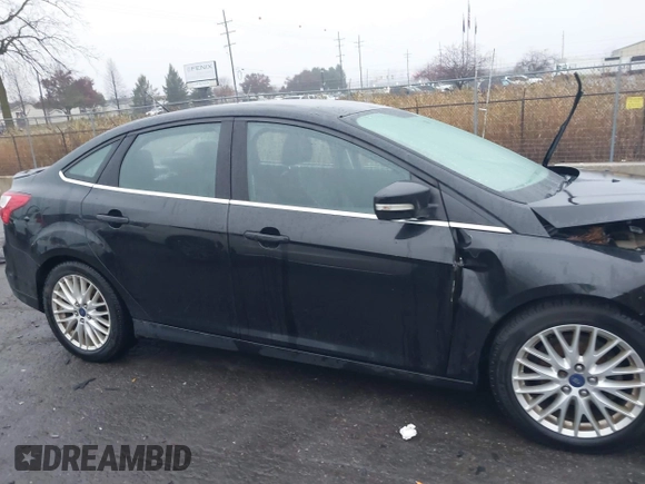 2014 Ford Focus Titanium with VIN 1FADP3J24EL439065, listed as a IAAI auction lot 40868973 with 167,739 mi miles. Bid and sale history available at carsss.com. Image 13.