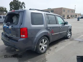 2015 Honda Pilot Touring with VIN 5FNYF3H91FB011847, listed as a IAAI auction lot 41841293 with 99,431 mi miles. Bid and sale history available at carsss.com. Image 4.