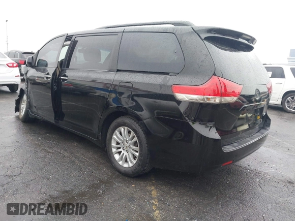 2011 Toyota Sienna XLE AAS with VIN 5TDYK3DC9BS068364, listed as a IAAI auction lot 41733881 with 157,972 mi miles. Bid and sale history available at carsss.com. Image 3.