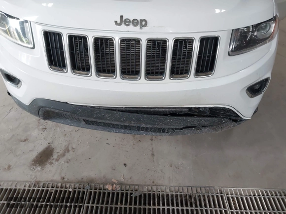 2014 Jeep Grand Cherokee Laredo with VIN 1C4RJFAG4EC309401, listed as a IAAI auction lot 41996233 with 243,541 mi miles and . Bid and sale history available at DreamBid. Image 6.