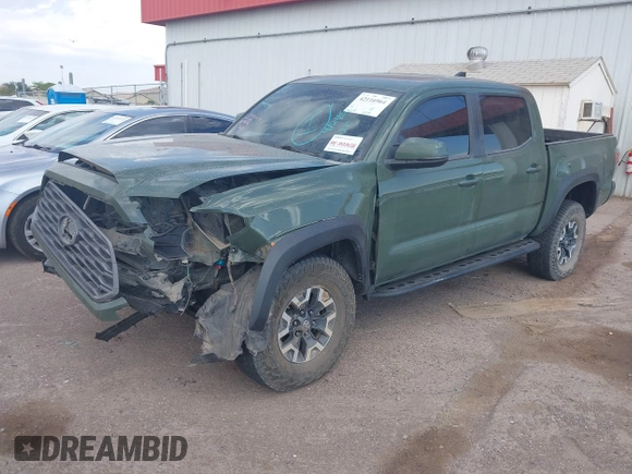 2021 Toyota Tacoma SR z VIN 3TYCZ5AN2MT049069, wystawiony jako IAAI lot #42116964 z przebiegiem 96 275 mil mil oraz . Historia ofert i sprzedaży dostępna na DreamBid. Obrazek 2.