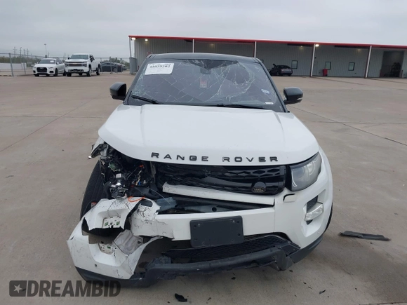 2013 Land Rover Range Rover Evoque Dynamic Premium z VIN SALVT2BG3DH741262, wystawiony jako IAAI lot #41059302 z przebiegiem Nie podano mil oraz . Historia ofert i sprzedaży dostępna na DreamBid. Obrazek 6.