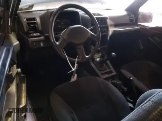 1995 Chevrolet Tracker z VIN 2CNBJ1866S6934268, wystawiony jako Copart lot #41997375 z przebiegiem 152 848 mil mil oraz Szkoda całkowita • Salvage title. Historia ofert i sprzedaży dostępna na DreamBid. Obrazek 8.
