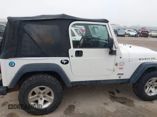 2006 Jeep Wrangler Rubicon with VIN 1J4FA69S16P710601, listed as a IAAI auction lot 41475818 with Not provided miles and . Bid and sale history available at DreamBid. Image 13.