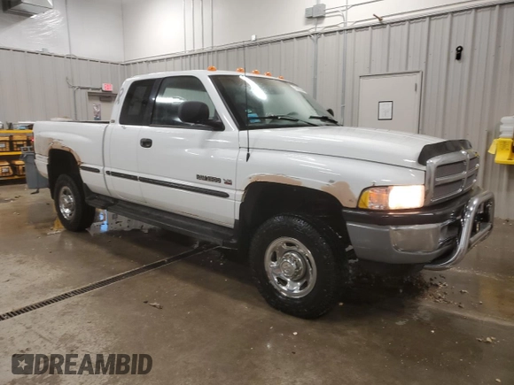 1999 Dodge Ram 2500 with VIN 1B7KF23W2XJ512012, listed as a Copart auction lot 77487064 with 151,465 mi miles and Clean Title. Bid and sale history available at carsss.com. Image 4.