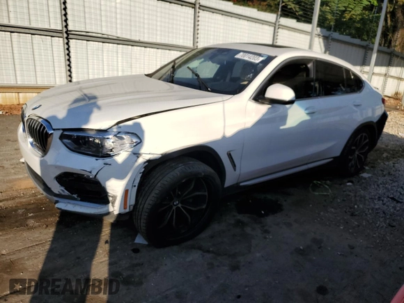 2020 BMW X4 xDrive30i with VIN 5UX2V1C05L9B34564, listed as a Copart auction lot 70014203 with 0 mi miles. Bid and sale history available at carsss.com. Image 1.