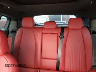 2023 Maserati Grecale Modena z VIN ZN682AVM0P7432182, wystawiony jako Copart lot #52376645 z przebiegiem 9 408 mil mil oraz Szkoda całkowita • Salvage title. Historia ofert i sprzedaży dostępna na DreamBid. Obrazek 10.