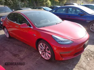 2018 Tesla Model 3 Long Range Battery with VIN 5YJ3E1EA5JF063555, listed as a IAAI auction lot 42028785 with 45,346 mi miles and . Bid and sale history available at DreamBid. Image 1.