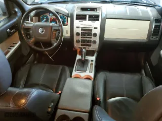 2010 Mercury Mariner Premier with VIN 4M2CN9H70AKJ24788, listed as a Copart auction lot 63035164 with 153,957 mi miles and Salvage Title. Bid and sale history available at carsss.com. Image 8.
