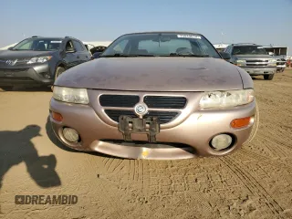 1996 Chrysler Sebring LXi z VIN 4C3AU52N4TE314534, wystawiony jako Copart lot #75043814 z przebiegiem 77 408 mil mil oraz Czysty tytuł • Clean title. Historia ofert i sprzedaży dostępna na DreamBid. Obrazek 5.