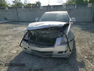 2011 Cadillac CTS Premium z VIN 1G6DS5ED2B0104323, wystawiony jako Copart lot #56596885 z przebiegiem Nie podano mil oraz Szkoda całkowita • Salvage title. Historia ofert i sprzedaży dostępna na DreamBid. Obrazek 13.