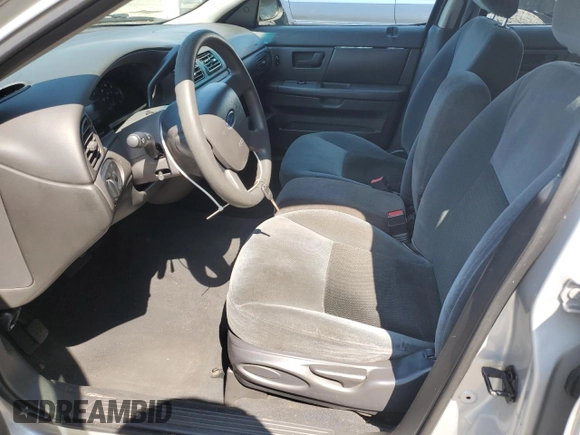 2005 Ford Taurus SE с VIN 1FAFP53U05A259841, выставлен на аукционе Copart как лот 57255835 с пробегом 179 821 миль миль и Списание • Salvage title. История ставок и продаж доступна на DreamBid. Изображение 7.