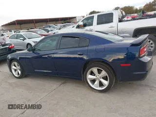 2014 Dodge Charger SXT with VIN 2C3CDXHG9EH315737, listed as a IAAI auction lot 41011662 with 98,104 mi miles and . Bid and sale history available at DreamBid. Image 13.