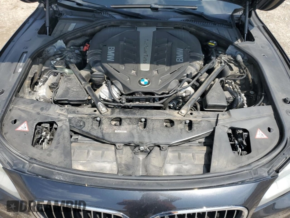 2015 BMW 7 Series 750Li z VIN WBAYE8C51FD782155, wystawiony jako Copart lot #54796505 z przebiegiem 112 772 mil mil oraz Szkoda całkowita • Salvage title. Historia ofert i sprzedaży dostępna na DreamBid. Obrazek 11.