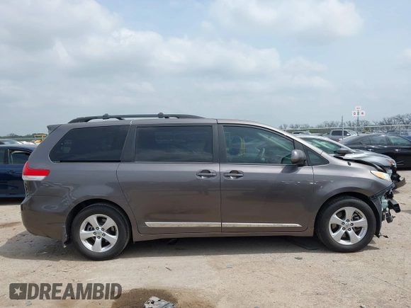 2013 Toyota Sienna LE AAS with VIN 5TDKK3DC1DS392577, listed as a IAAI auction lot 41932168 with 90,643 mi miles and . Bid and sale history available at DreamBid. Image 13.
