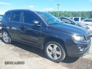 2015 Jeep Compass Latitude with VIN 1C4NJCEBXFD179373, listed as a IAAI auction lot 39380614 with 104,832 mi miles. Bid and sale history available at carsss.com. Image 14.