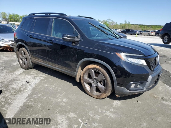 2019 Honda Passport Touring with VIN 5FNYF7H90KB000193, listed as a Copart auction lot 52402915 with 120,968 mi miles and Salvage title. Bid and sale history available at DreamBid. Image 4.