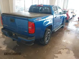 2021 Chevrolet Colorado 4WD Z71 with VIN 1GCGTDEN7M1141049, listed as a IAAI auction lot 41223962 with 62,114 mi miles and . Bid and sale history available at DreamBid. Image 4.
