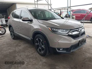 2018 Honda CR-V Touring with VIN 5J6RW2H92JL012021, listed as a IAAI auction lot 41681308 with 110,086 mi miles. Bid and sale history available at carsss.com. Image 1.