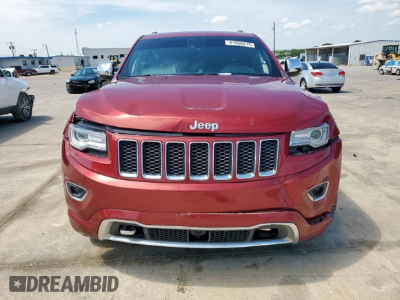 2015 Jeep Grand Cherokee Overland with VIN 1C4RJECG3FC686536, listed as a Copart auction lot 61058215 with 132,282 mi miles and Salvage title. Bid and sale history available at DreamBid. Image 5.