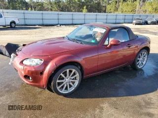 2006 Mazda MX-5 Miata Grand Touring z VIN JM1NC25F660122876, wystawiony jako Copart lot #81297654 z przebiegiem 120 397 mil mil oraz Szkoda całkowita • Salvage title. Historia ofert i sprzedaży dostępna na DreamBid. Obrazek 1.