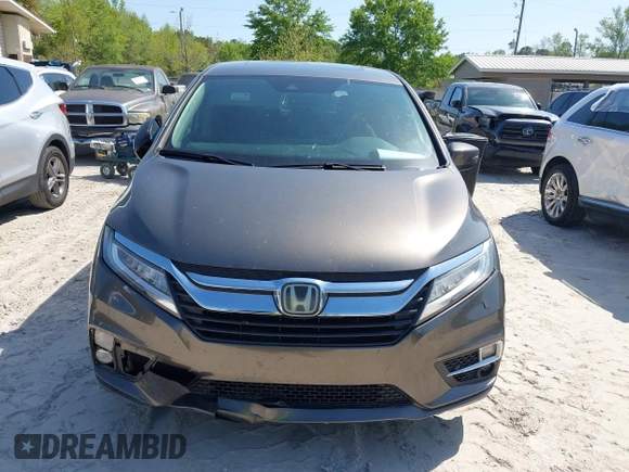 2020 Honda Odyssey Touring with VIN 5FNRL6H87LB002202, listed as a IAAI auction lot 42015741 with 182,051 mi miles and . Bid and sale history available at DreamBid. Image 12.
