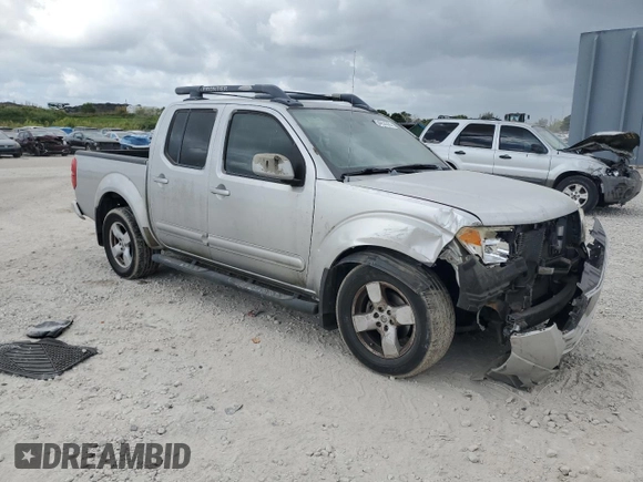 2005 Nissan Frontier LE with VIN 1N6AD07U75C452872, listed as a Copart auction lot 54954555 with 230,702 mi miles and Salvage title. Bid and sale history available at DreamBid. Image 4.