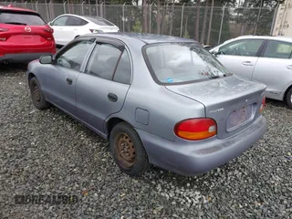 1997 Hyundai Accent z VIN KMHVF24N2VU365832, wystawiony jako IAAI lot #41549953 z przebiegiem 168 072 mil mil oraz . Historia ofert i sprzedaży dostępna na DreamBid. Obrazek 3.
