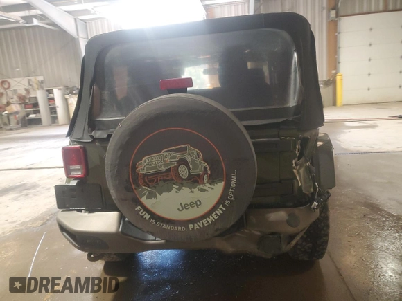 2016 Jeep Wrangler Sahara с VIN 1C4AJWBG5GL221617, выставлен на аукционе Copart как лот 48805755 с пробегом 70 883 миль миль и Списание • Salvage title. История ставок и продаж доступна на DreamBid. Изображение 6.