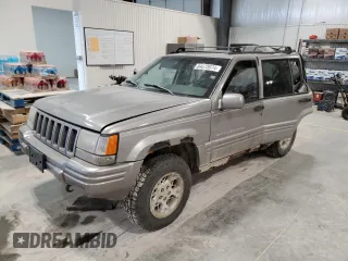1997 Jeep Grand Cherokee Limited with VIN 1J4GZ78Y4VC589688, listed as a Copart auction lot 84673974 with 183,930 mi miles and Salvage Title. Bid and sale history available at carsss.com. Image 1.